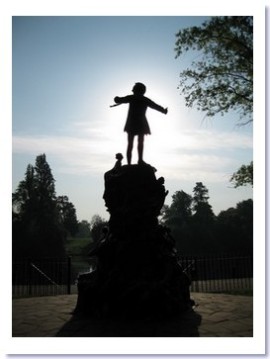 image silhouette of Peter Pan statue